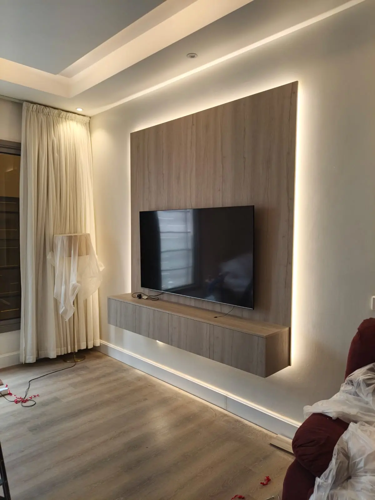 Floating TV unit with backlighting